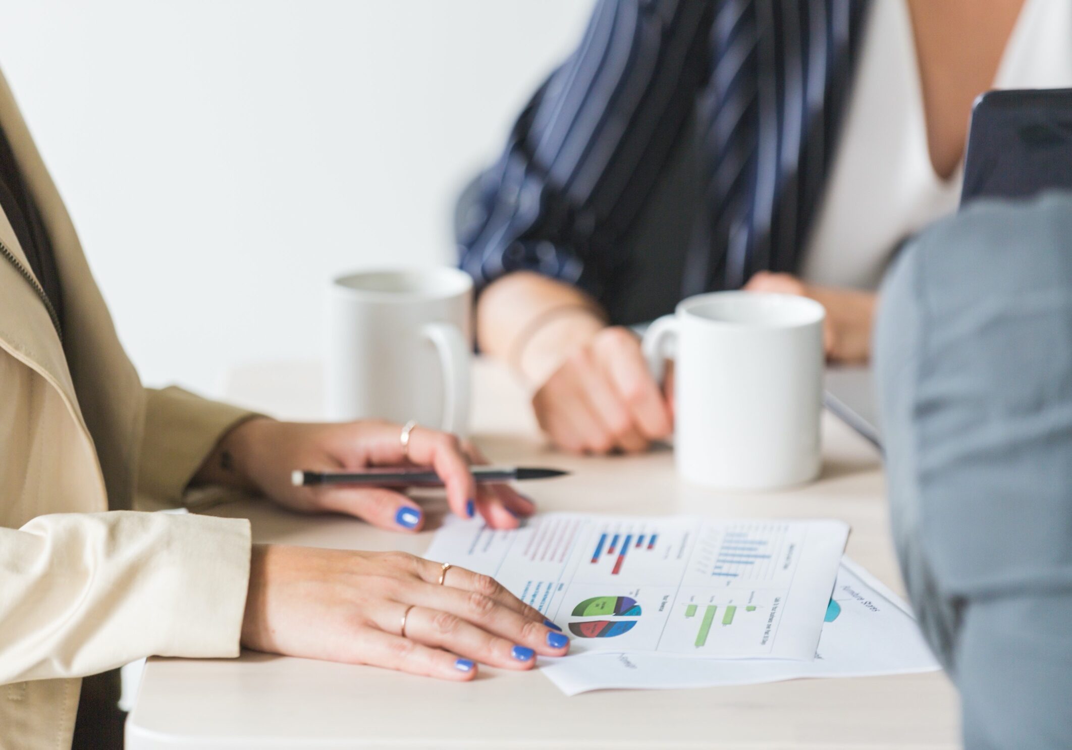 reading-charts-at-business-meeting (1)